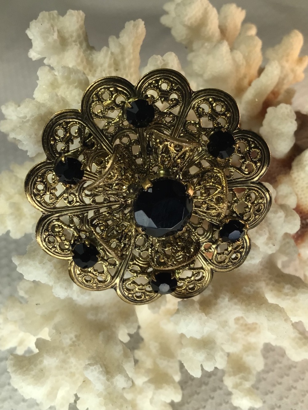 Vintage Gold-Toned Brooch with Black Glass Rhinestones in a Filigree Design